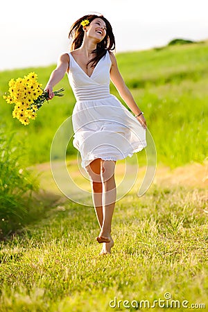 adorable-happy-summer-woman-skipping-18123573.jpg